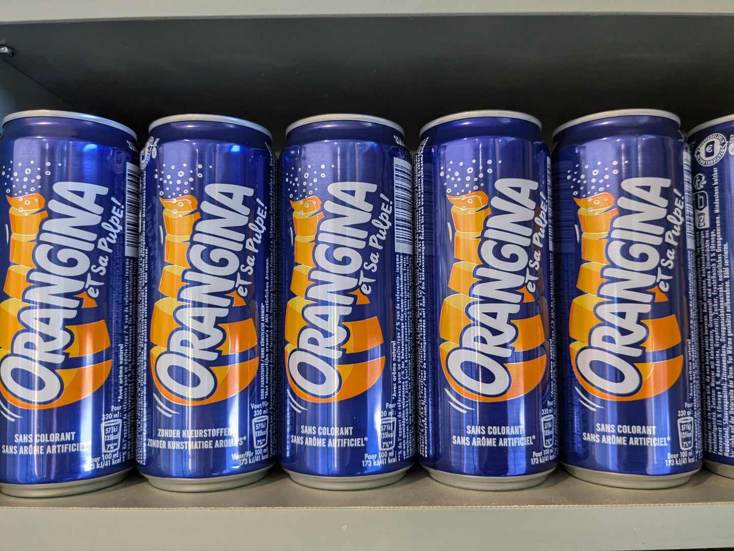 Orangina Cans